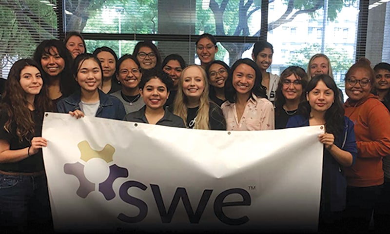 photo of cal state fullerton students at a society of women engineers event