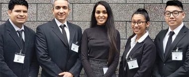cal state fullerton students posing for picture at cybersecurity event